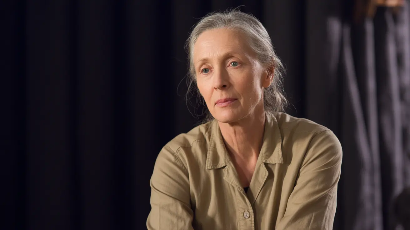 Dr. Jane Goodall observing chimpanzees in the wild